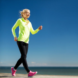 woman walking along a beach